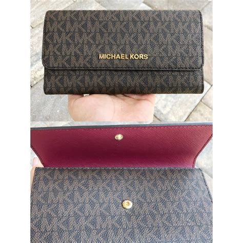 michael kors wallet 16cm|Michael Kors oversized wallet.